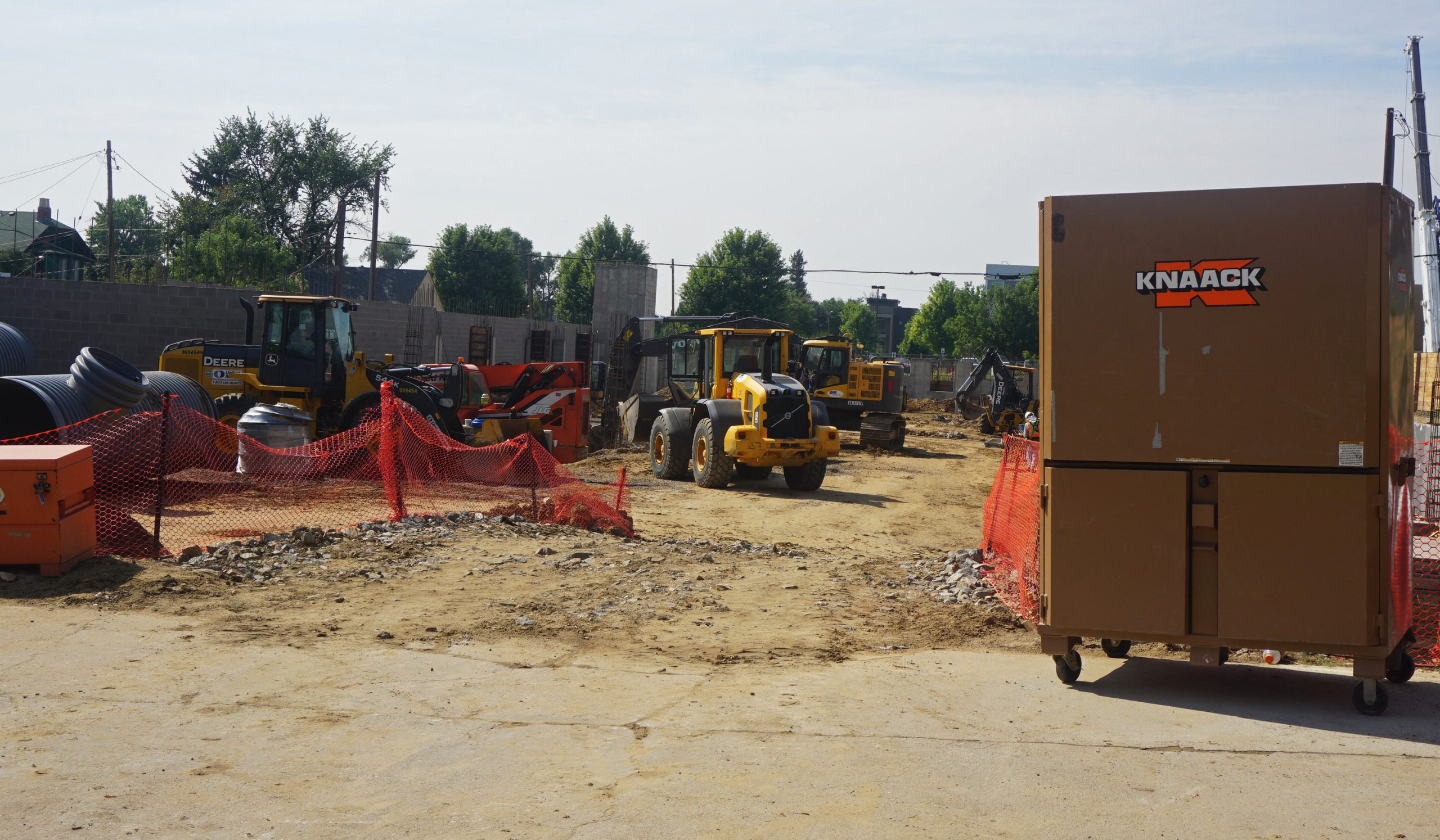 Across the street from the Twin 9s site, construction is underway on a large apartment complex. 